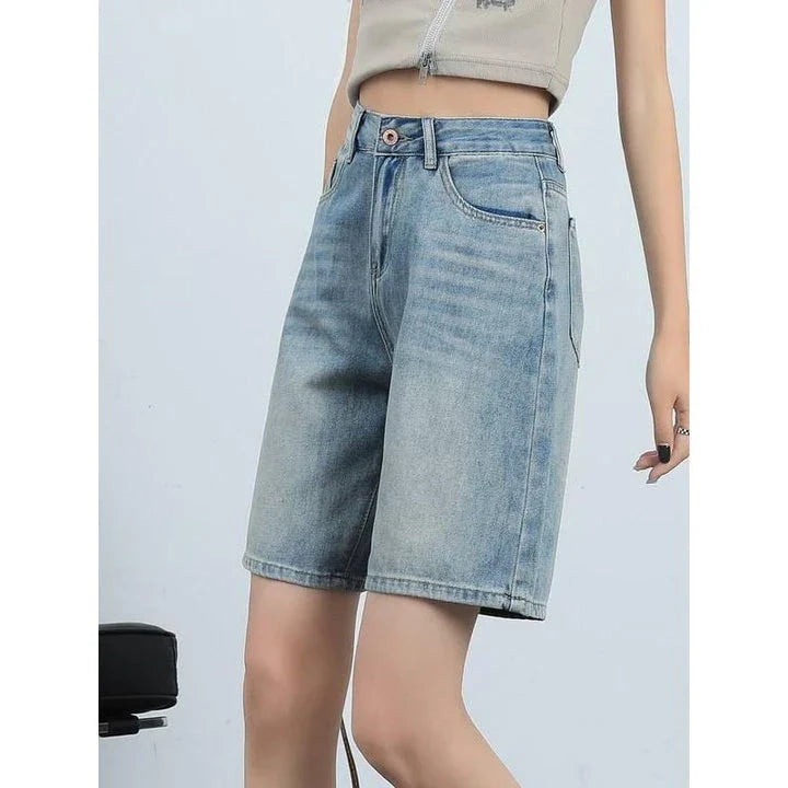 High-waist knee-length denim shorts for women, featuring a flattering silhouette and versatile casual style.