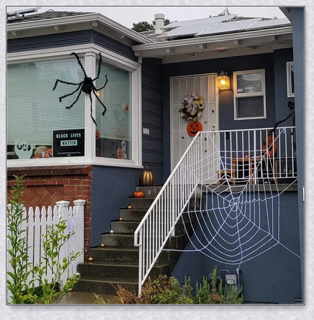 Webby Giant Halloween Spider Web - Massive, stretchy black and white web for creating a spooky, haunting atmosphere