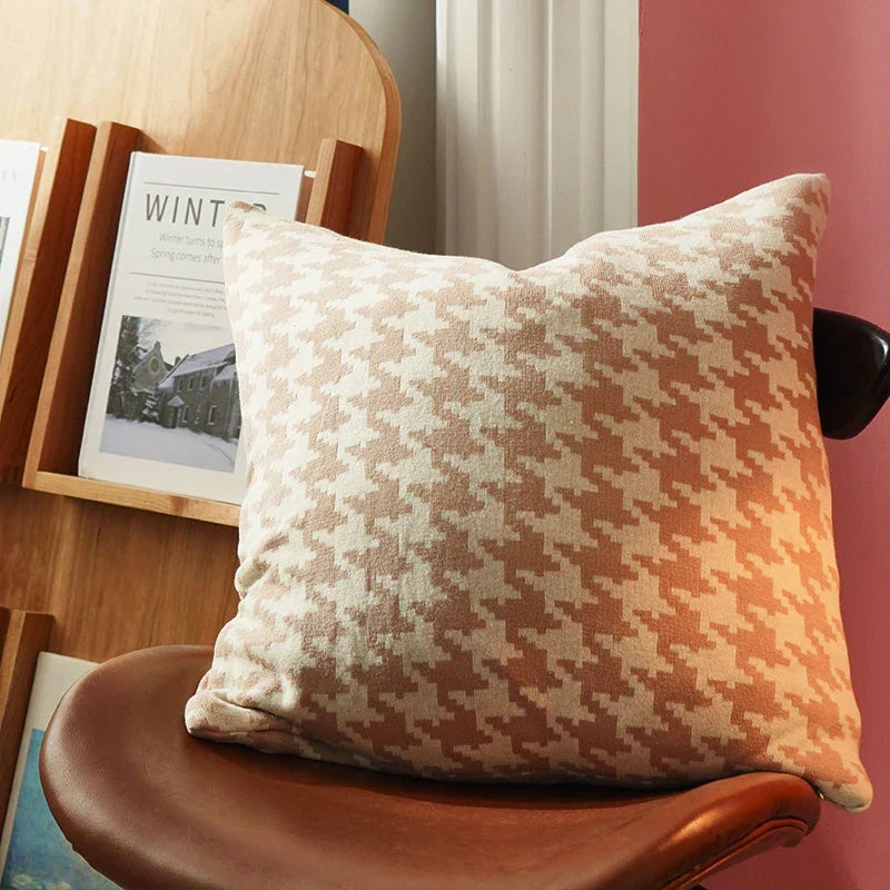 A classic houndstooth-patterned throw pillow cover made from premium 100% cotton with a high thread count for a luxurious feel.