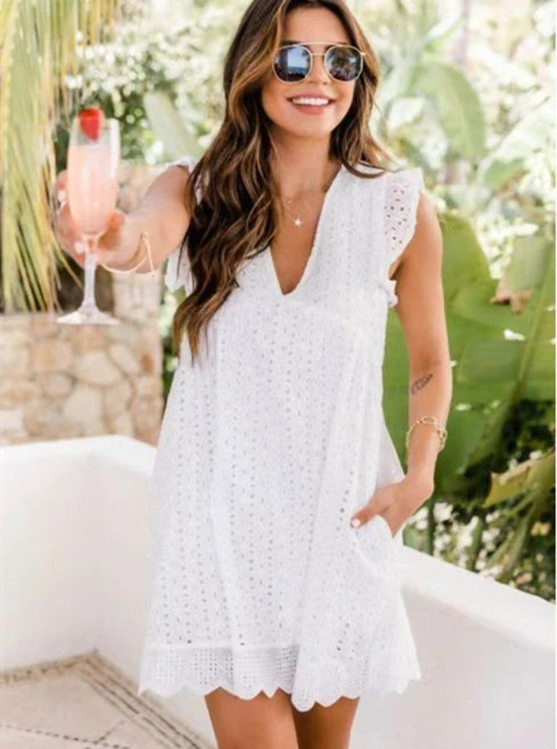 Stylish summer beach dress with lace accents, pockets, and a variety of vibrant color options