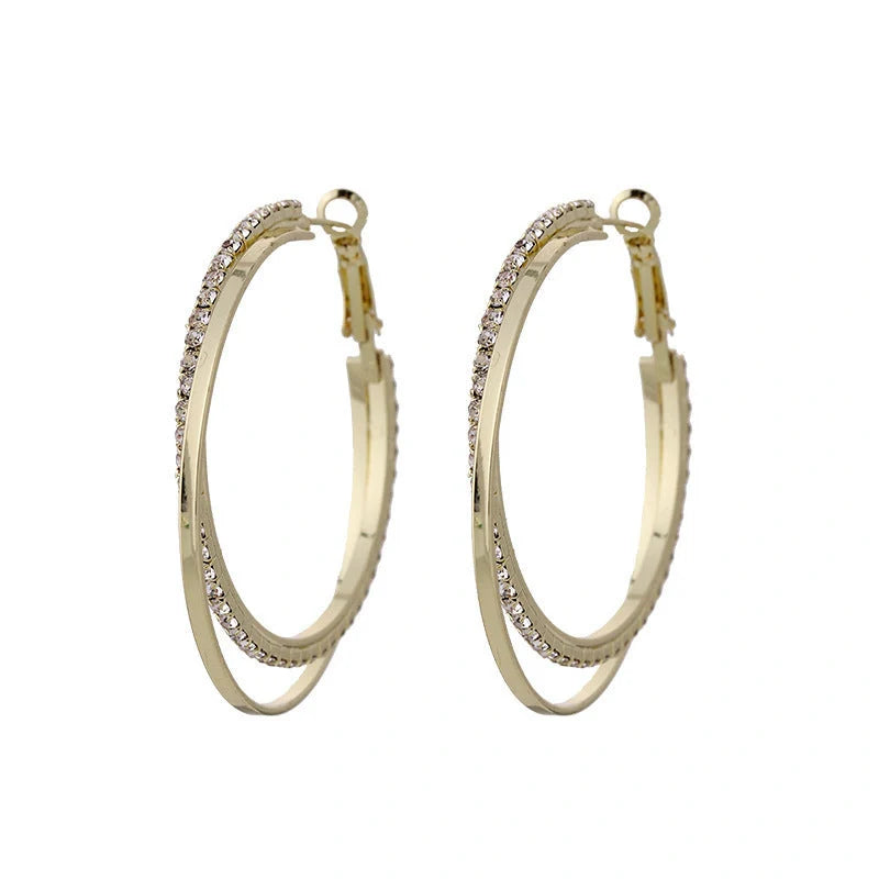 Elegant geometric metal earrings for women in gold and silver finishes