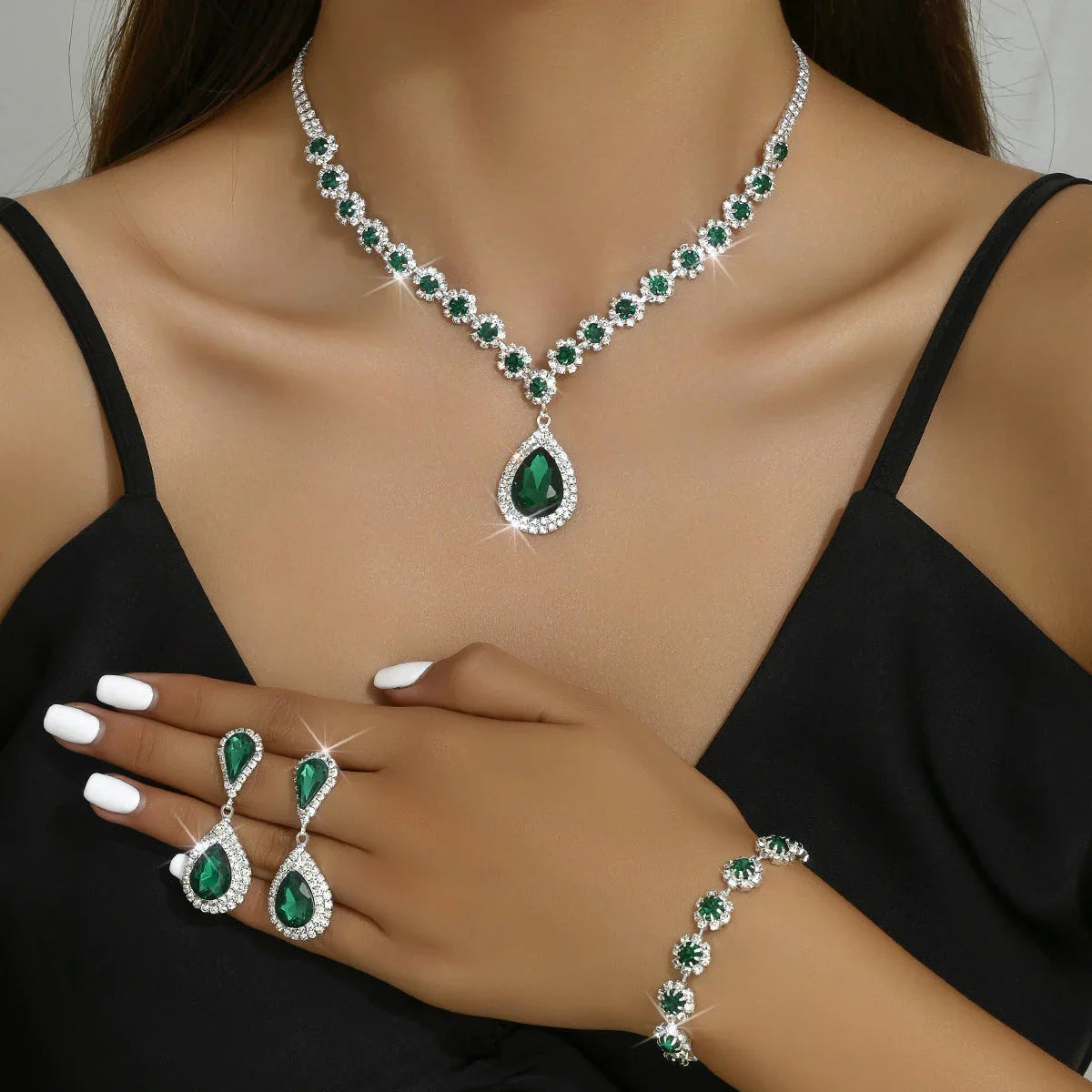 Bridal jewelry set with necklace, earrings, and bracelet featuring a sun and moon design with rhinestones