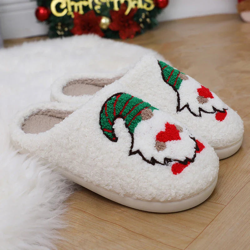 Cozy Santa Claus-themed slippers with plush upper and anti-slip soles for comfortable indoor wear during the holidays