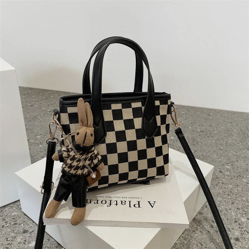 Premium houndstooth and plaid crossbody bags with stylish patterns, comfortable wool material, and versatile design