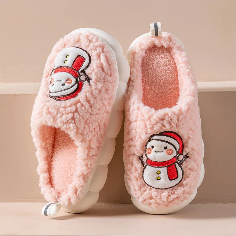 Cozy snowman-themed slippers with plush interior and thick, anti-slip soles for warm, comfortable indoor wear