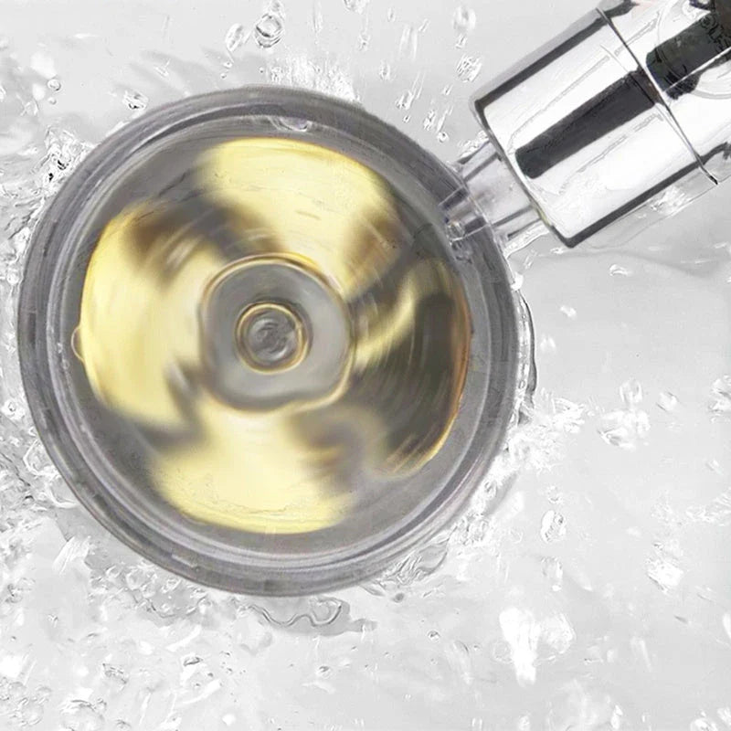 A high-pressure handheld shower head with a turbo-charged water flow and a cotton filter for a luxurious, spa-like bathing experience.