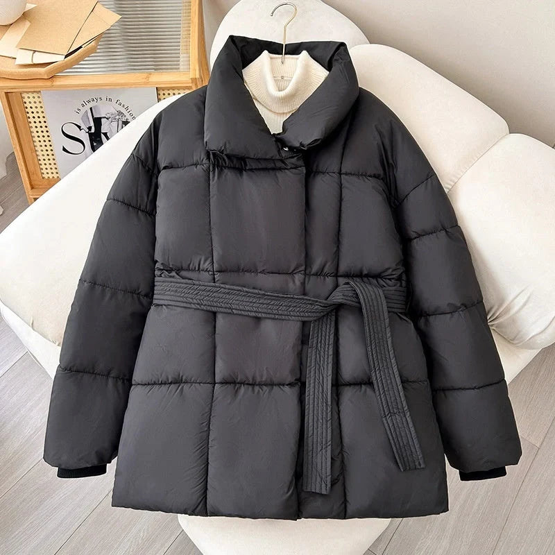 Stylish plaid belted winter coat for women in black, white, and brown