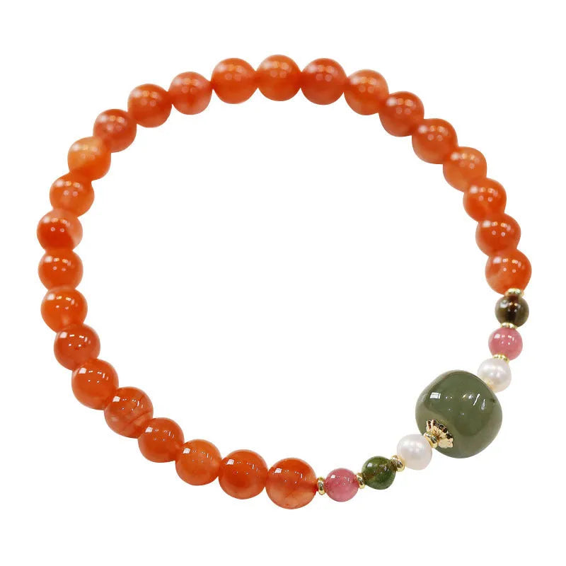 Natural Sichuan cherry red South Red Agate round bead bracelet in retro ethnic style.