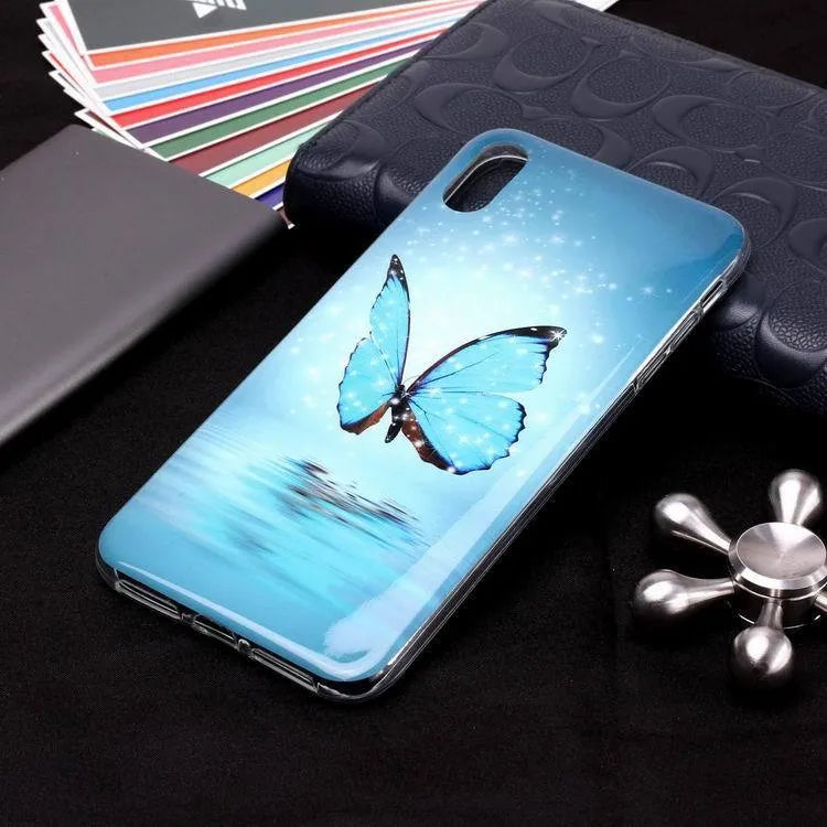 Luminous cartoon butterfly design on a flexible TPU iPhone back cover case.