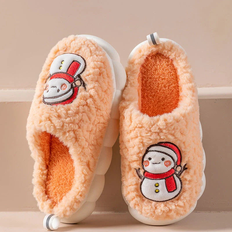 Cozy snowman-themed slippers with plush interior and thick, anti-slip soles for warm, comfortable indoor wear