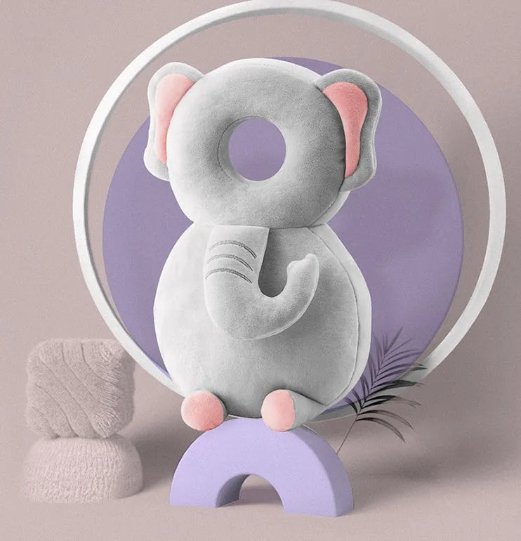 Round baby neck pillow in animal design with elastic straps for anti-fall protection.