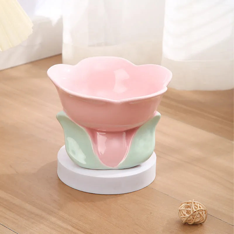 Blue ceramic raised pet bowl with floral pattern and non-slip base for cats or small dogs
