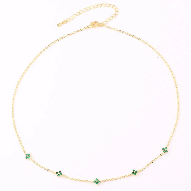 Elegant gold and silver floral necklace with adjustable chain and flower charm, perfect for vacation and beach outfits