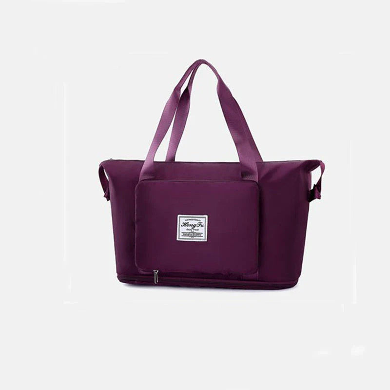 Stylish and spacious foldable travel bag for women, featuring a water-resistant Oxford cloth construction, multiple pockets, and convenient carrying options.