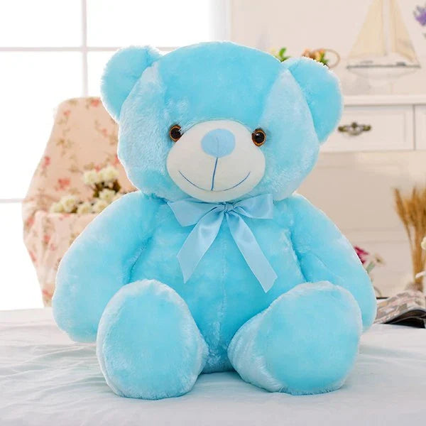 Illuminating plush teddy bear with color-changing LED lights, soft and huggable design in various sizes and colors