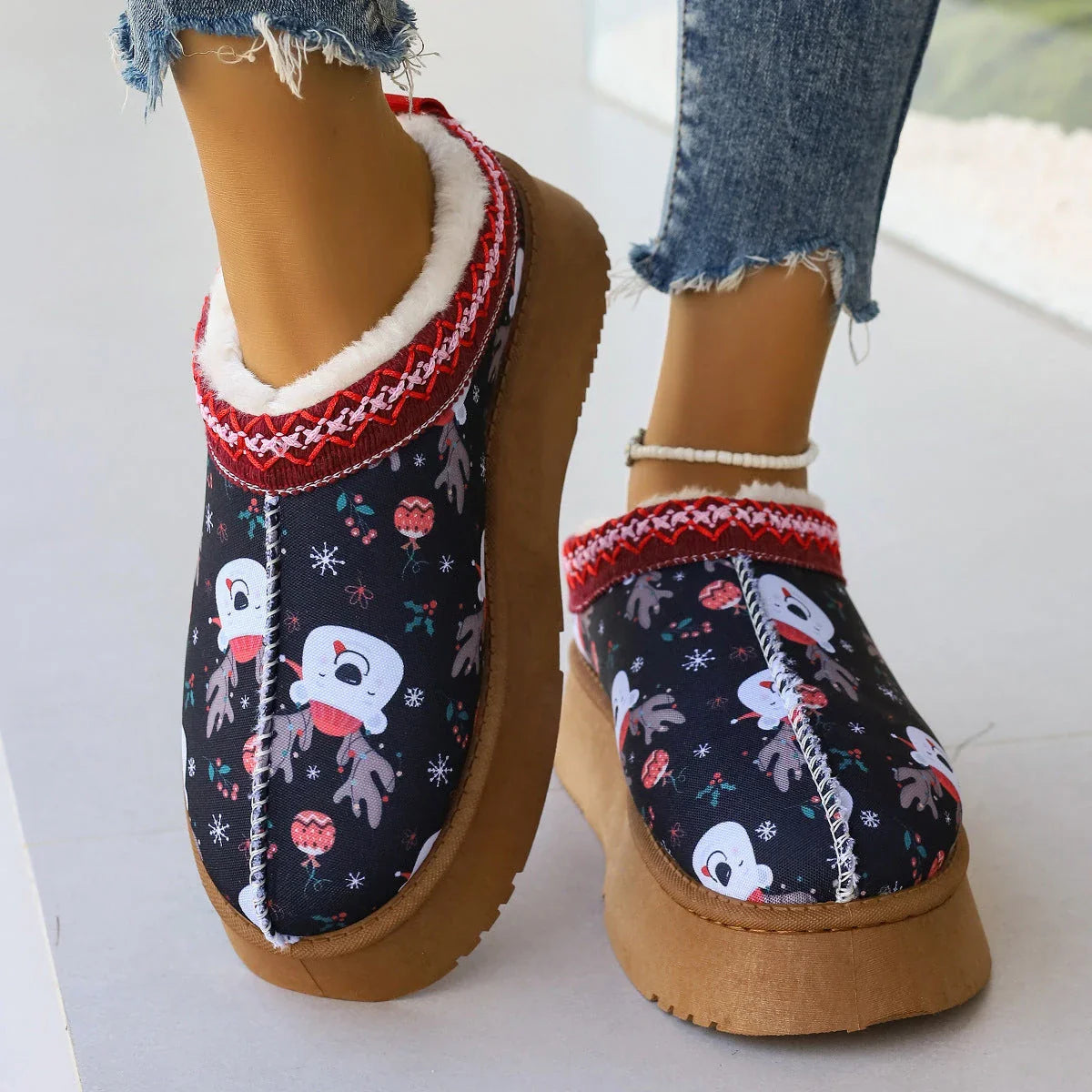 Cozy winter ankle boots featuring festive Christmas prints and plush lining for women