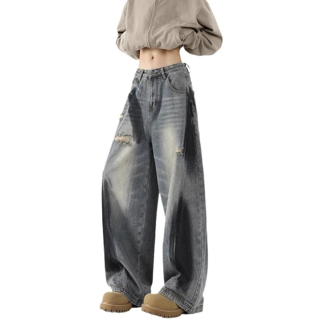 Men's blue ripped jeans with splash-ink distressing and loose fit