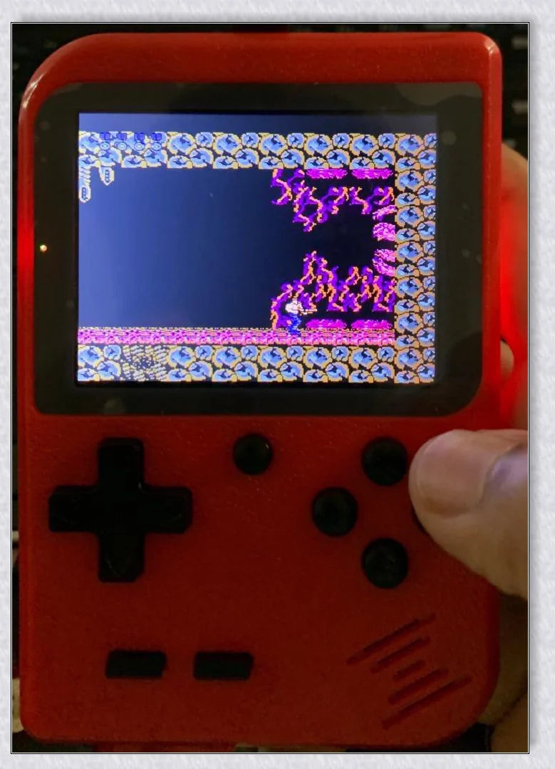 Tinytendo (400 Games Built In) - A compact handheld console with a vibrant 3-inch screen and 500 classic retro games built-in