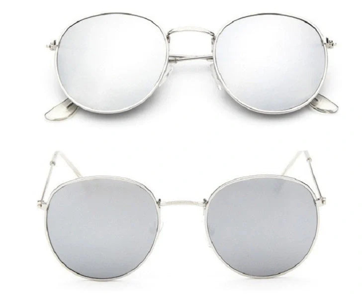 Stylish retro sunglasses for women with metal frame and glass lenses