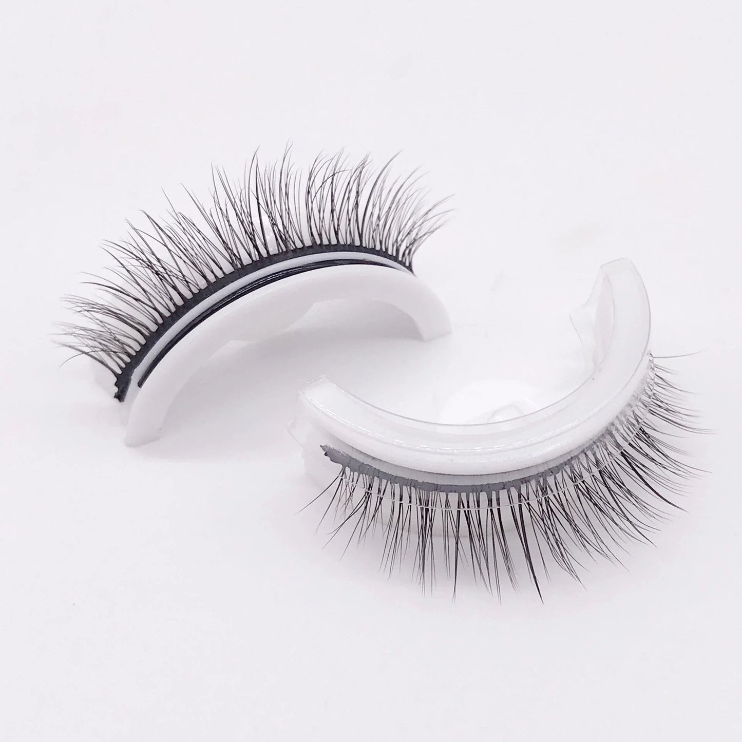 Glamorous 3D mink-inspired false eyelashes in various styles and packaging