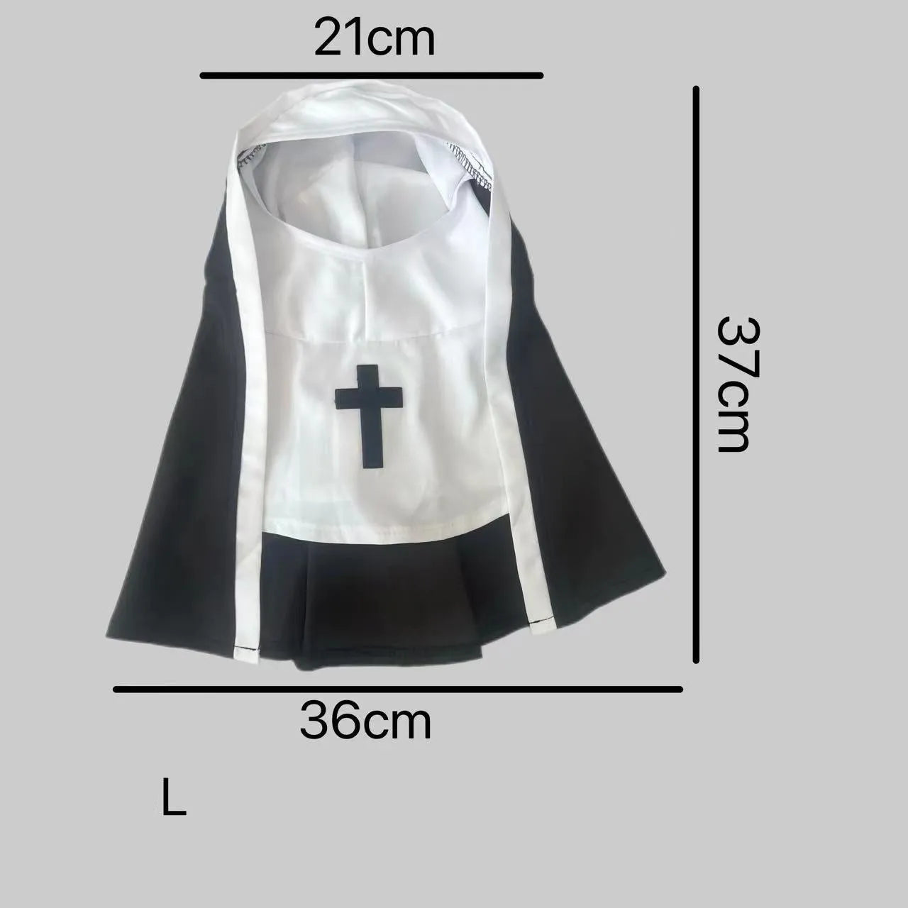Black and white nun costume cloak for a small dog on a Halloween backdrop.