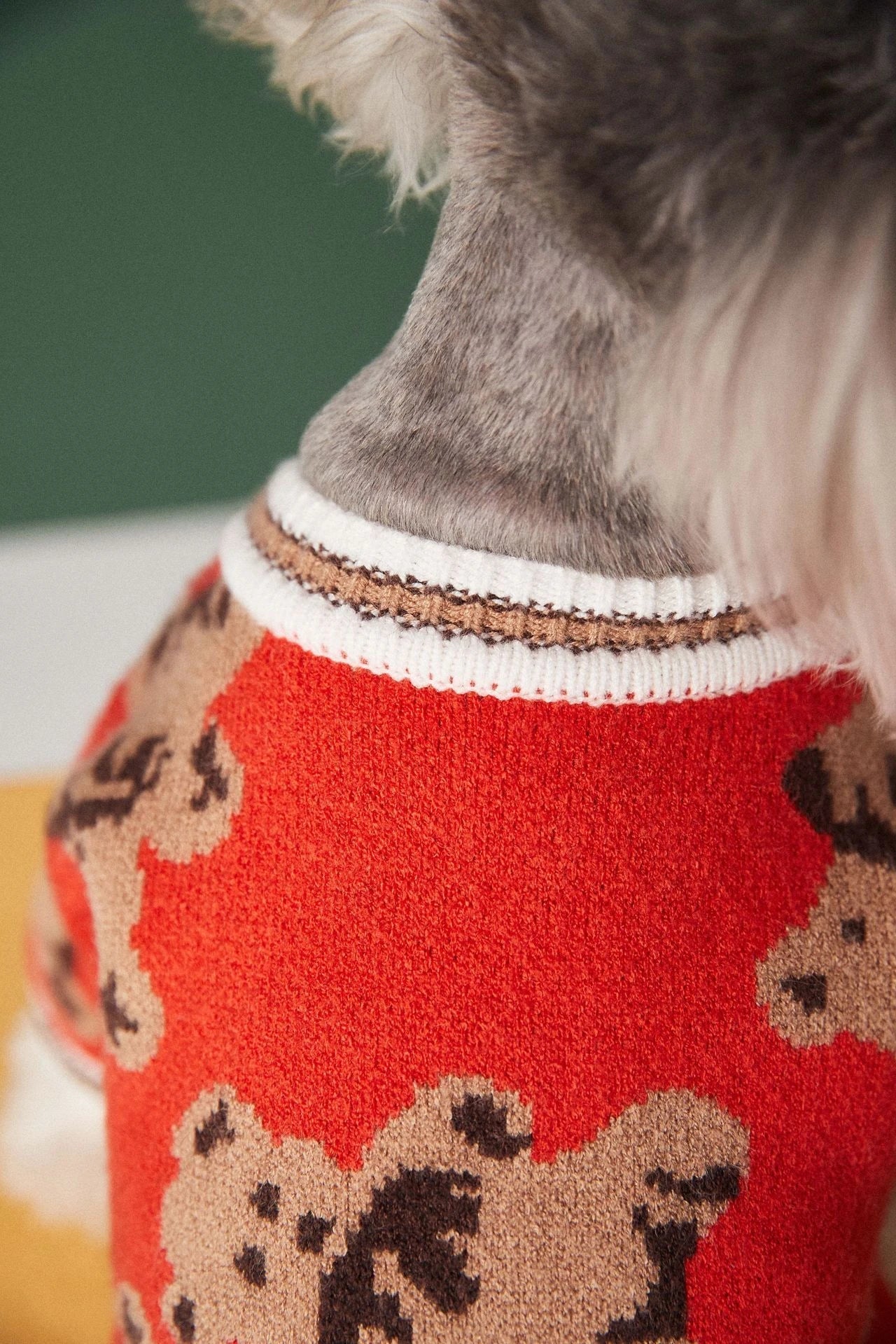Cosy knitted pet jumper in classic British striped design, available in light blue, beige, and red colours