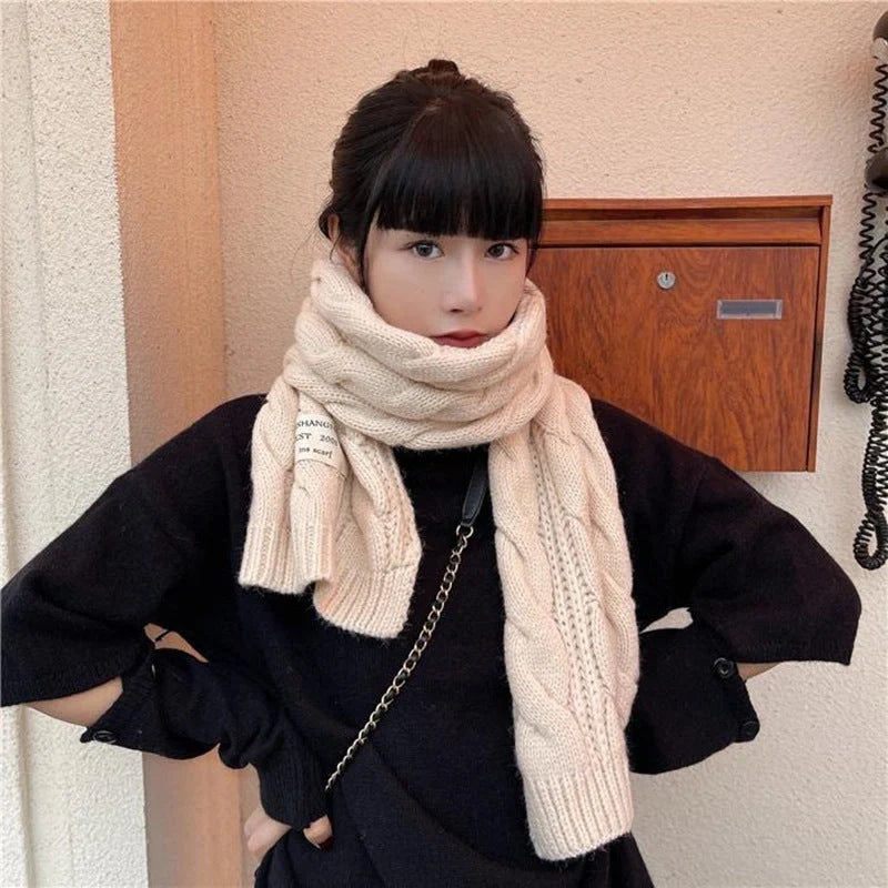 Soft, velvety Apricot Scarf with elegant patterns, perfect for keeping warm during the British winter