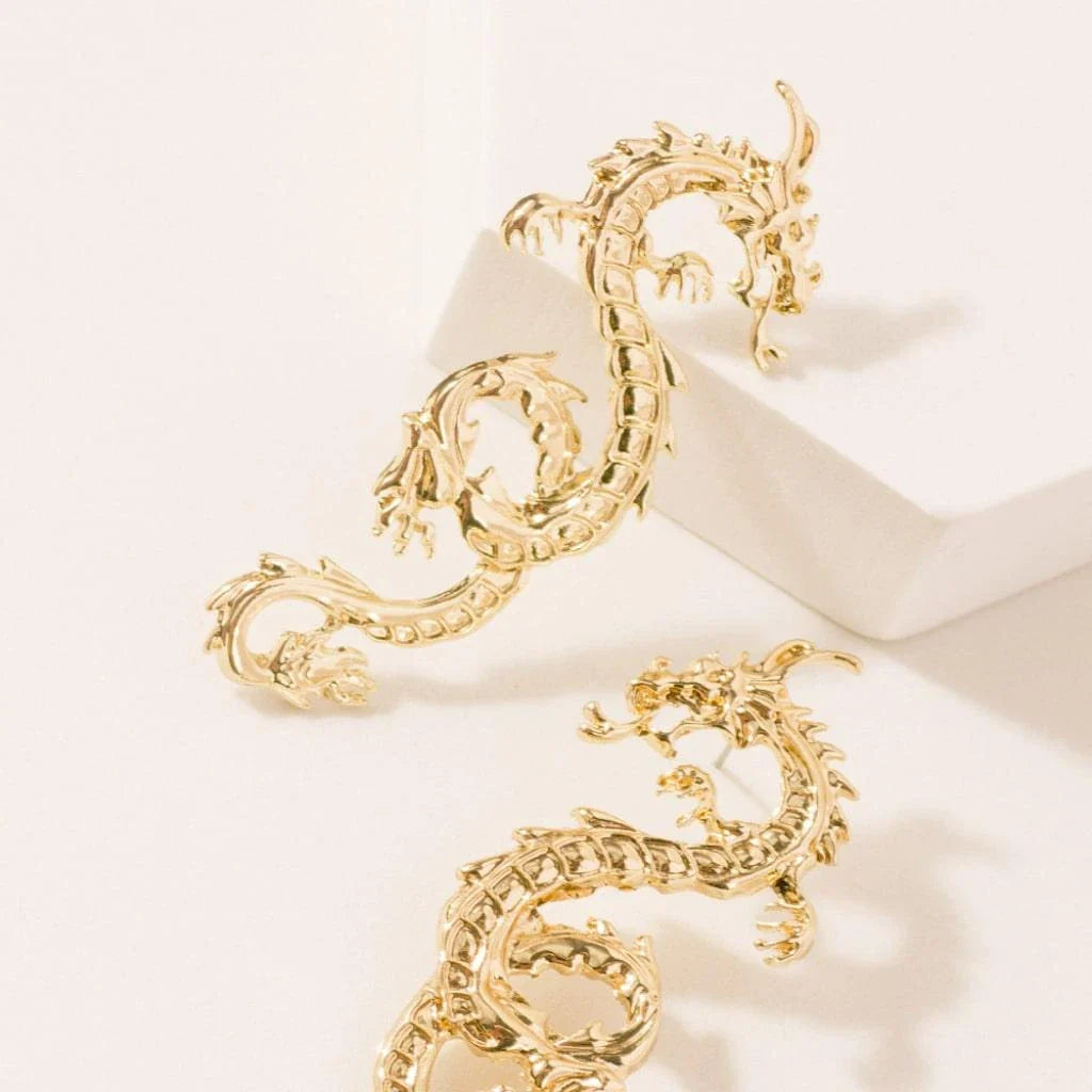 Magnificent golden dragon stud earrings with intricate details and a substantial, comfortable weight
