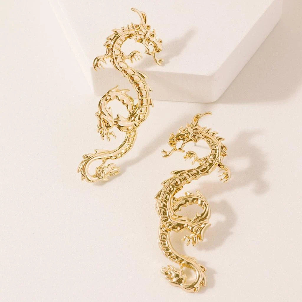Magnificent golden dragon stud earrings with intricate details and a substantial, comfortable weight