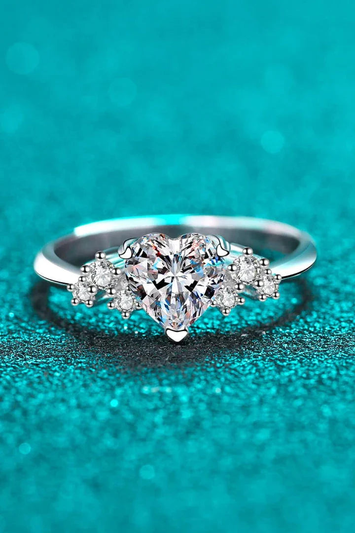 Elegant 1 carat moissanite heart-shaped ring with sterling silver setting and zircon accents