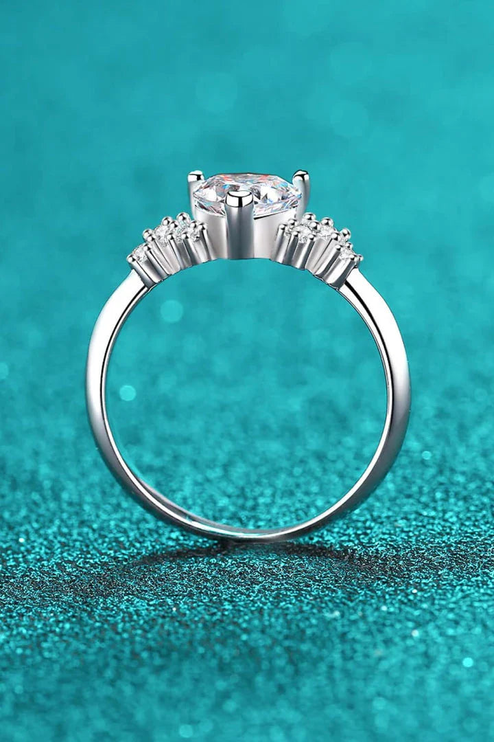 Elegant 1 carat moissanite heart-shaped ring with sterling silver setting and zircon accents