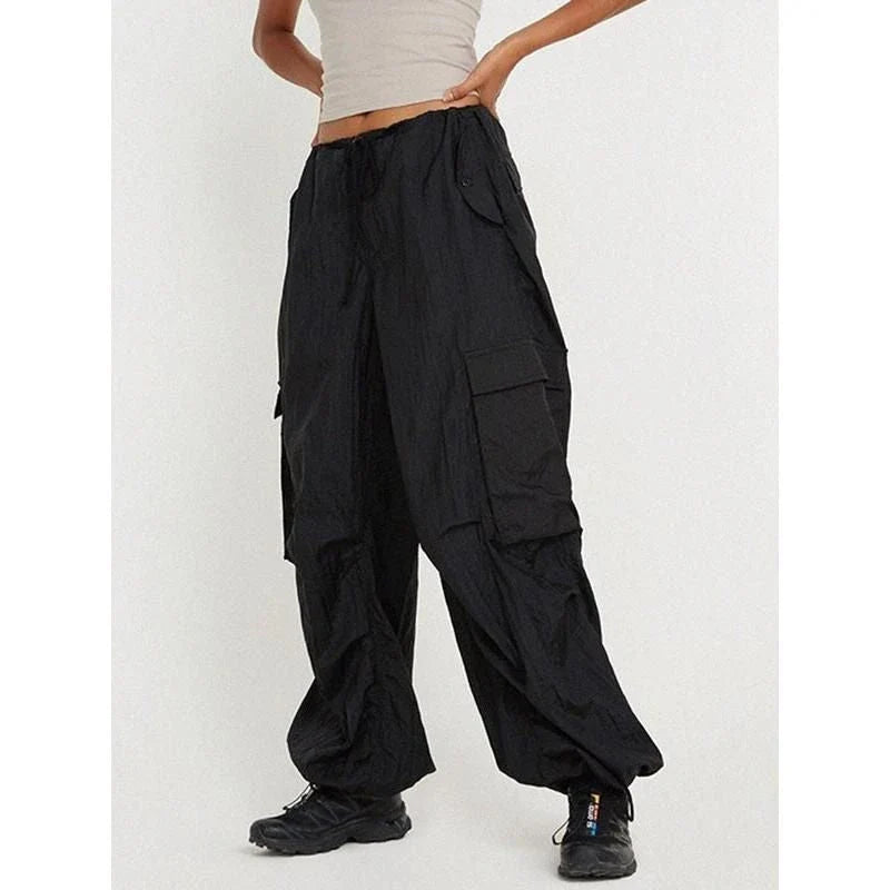 High-waist safari-style cargo trousers in black, featuring a comfortable, relaxed fit and unique design elements