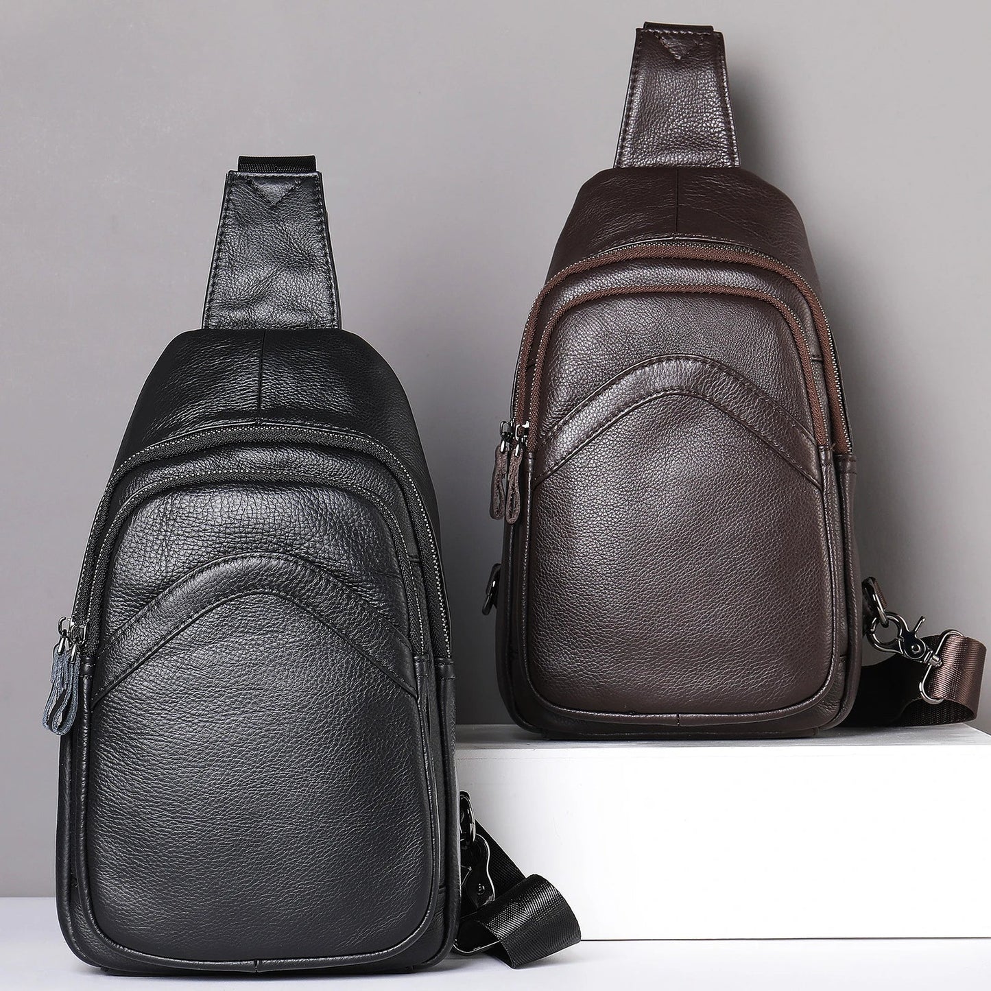 Durable leather messenger bag with adjustable shoulder strap and spacious main compartment for secure storage and organisation