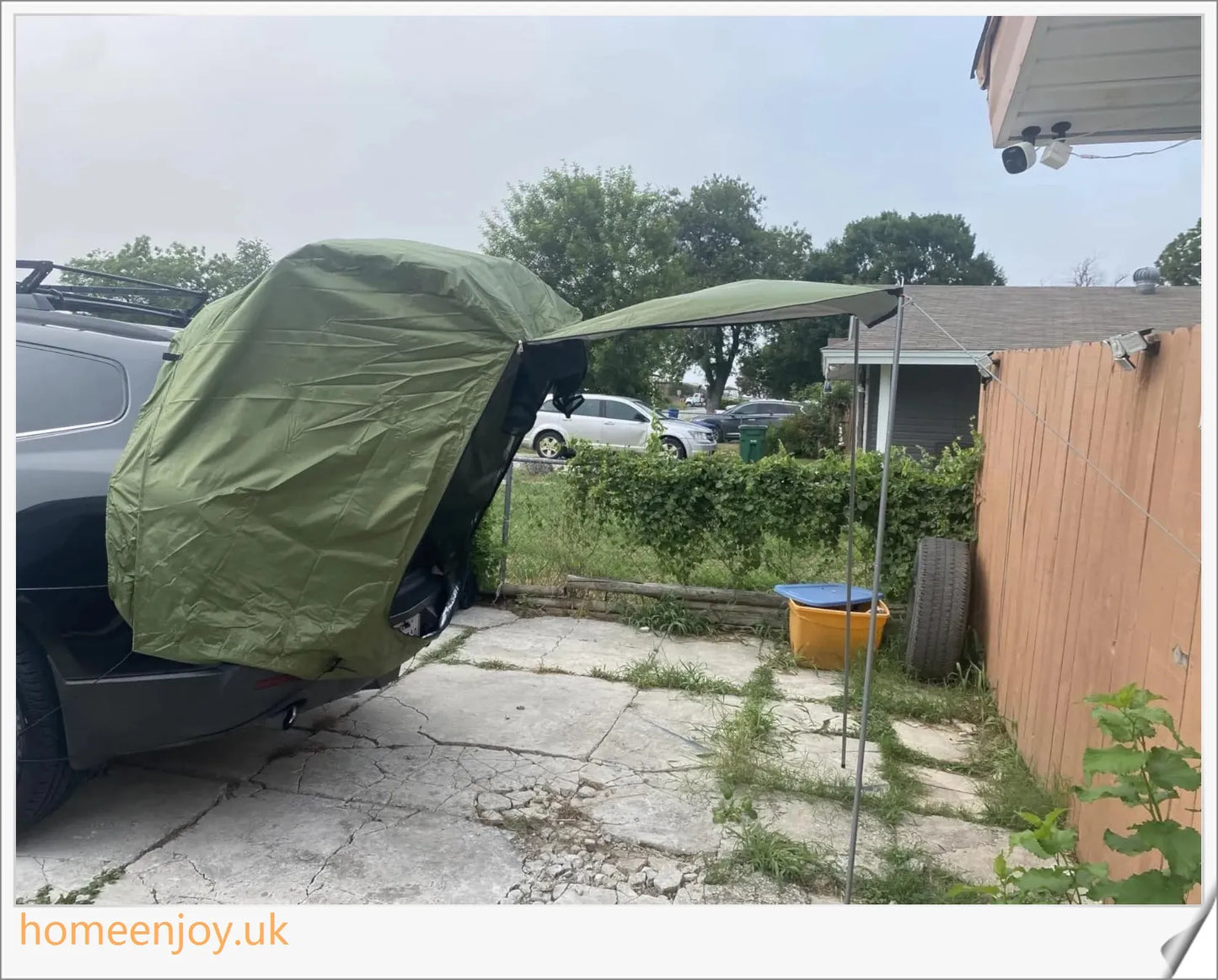 Weatherproof and versatile car trunk extension tent for outdoor adventures, with dual-layer design and secure magnetic fit
