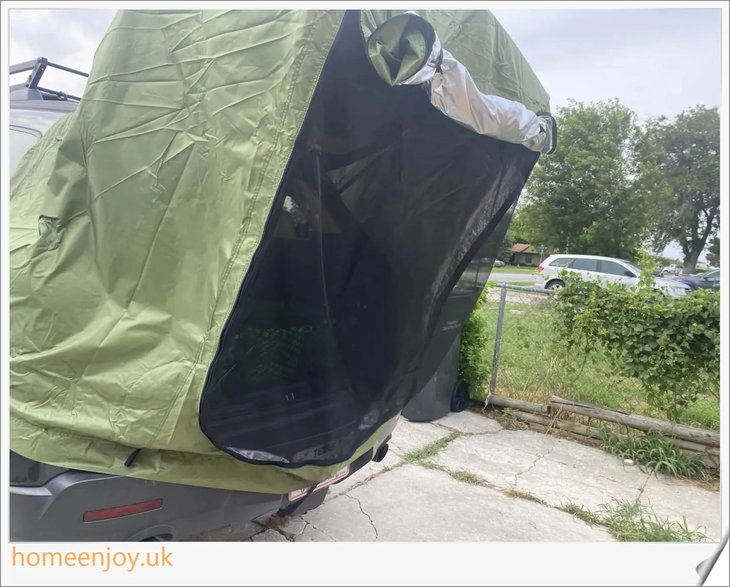 Weatherproof and versatile car trunk extension tent for outdoor adventures, with dual-layer design and secure magnetic fit