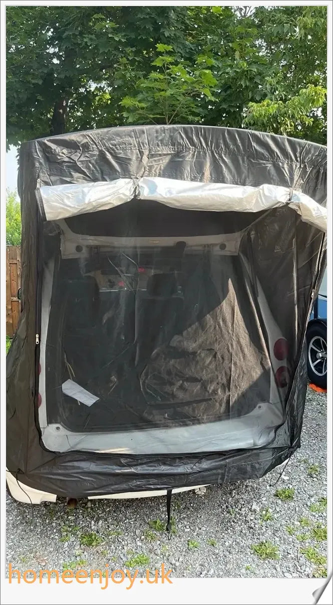 Weatherproof and versatile car trunk extension tent for outdoor adventures, with dual-layer design and secure magnetic fit