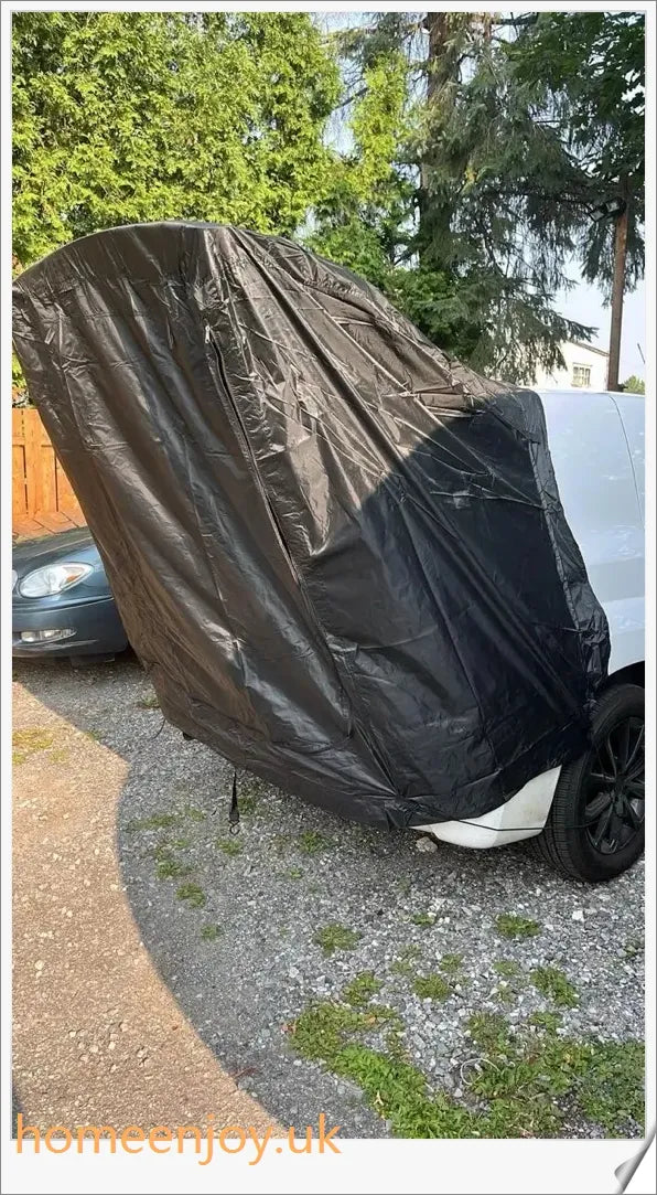 Weatherproof and versatile car trunk extension tent for outdoor adventures, with dual-layer design and secure magnetic fit