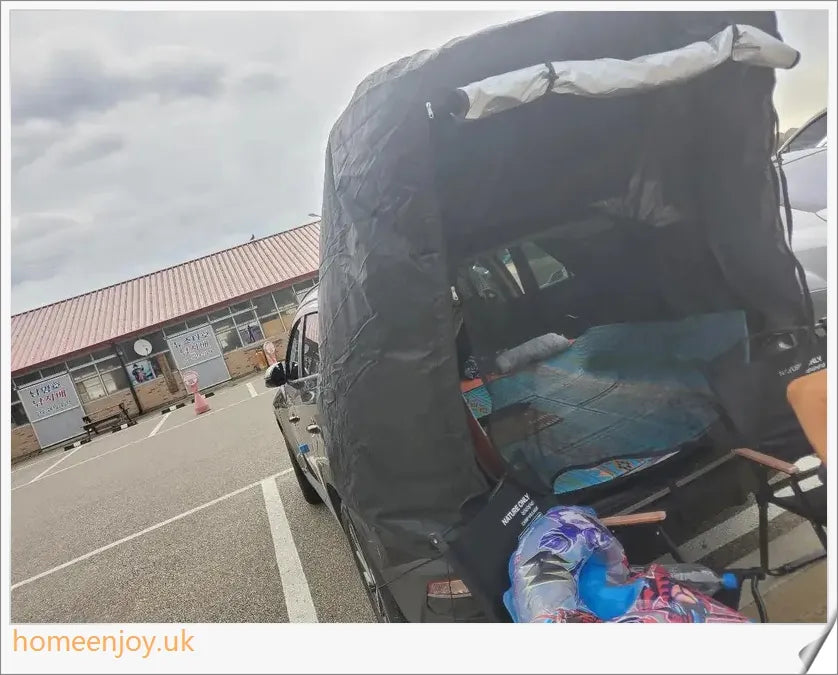 Weatherproof and versatile car trunk extension tent for outdoor adventures, with dual-layer design and secure magnetic fit