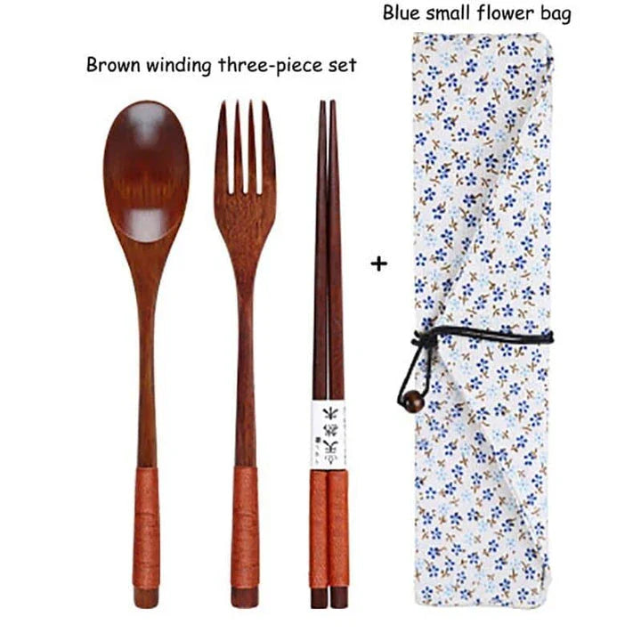 A portable wooden cutlery set with a coordinating cloth bag, perfect for outdoor dining and travel.