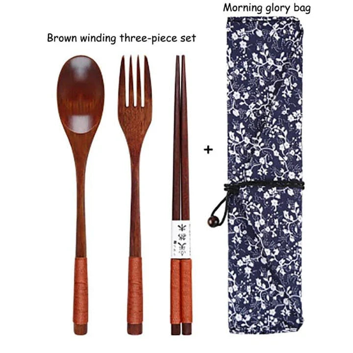 A portable wooden cutlery set with a coordinating cloth bag, perfect for outdoor dining and travel.