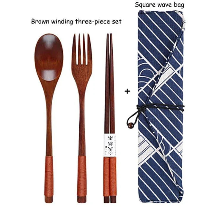 A portable wooden cutlery set with a coordinating cloth bag, perfect for outdoor dining and travel.