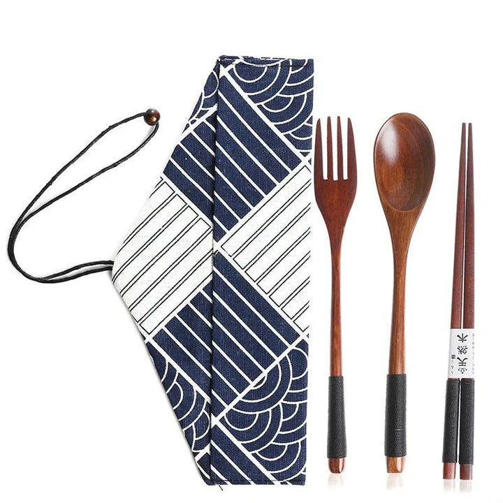 A portable wooden cutlery set with a coordinating cloth bag, perfect for outdoor dining and travel.
