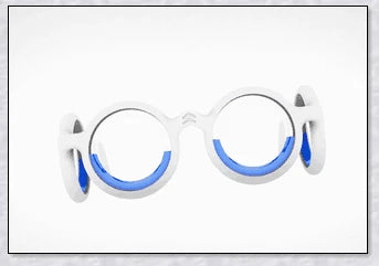 A pair of black motion sickness glasses with a blue liquid-filled ring to create an artificial horizon and relieve nausea, dizziness, and vertigo during travel.