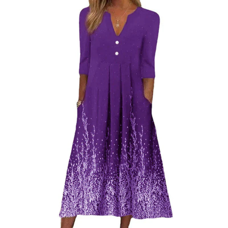 A sophisticated digital printed v-neck long-sleeved dress in vibrant colours, perfect for any occasion.