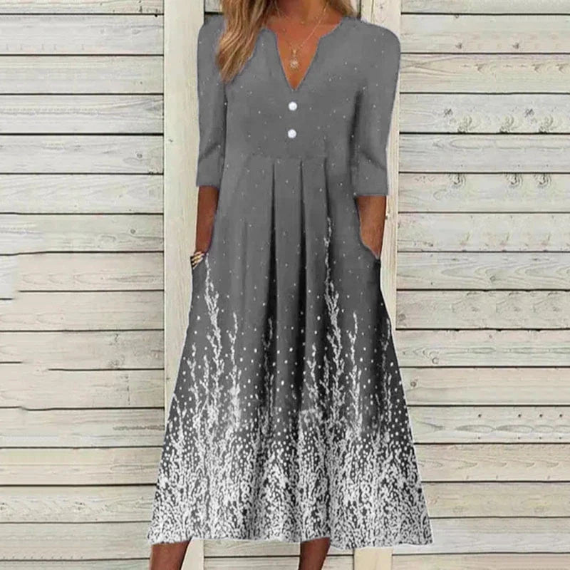 A sophisticated digital printed v-neck long-sleeved dress in vibrant colours, perfect for any occasion.