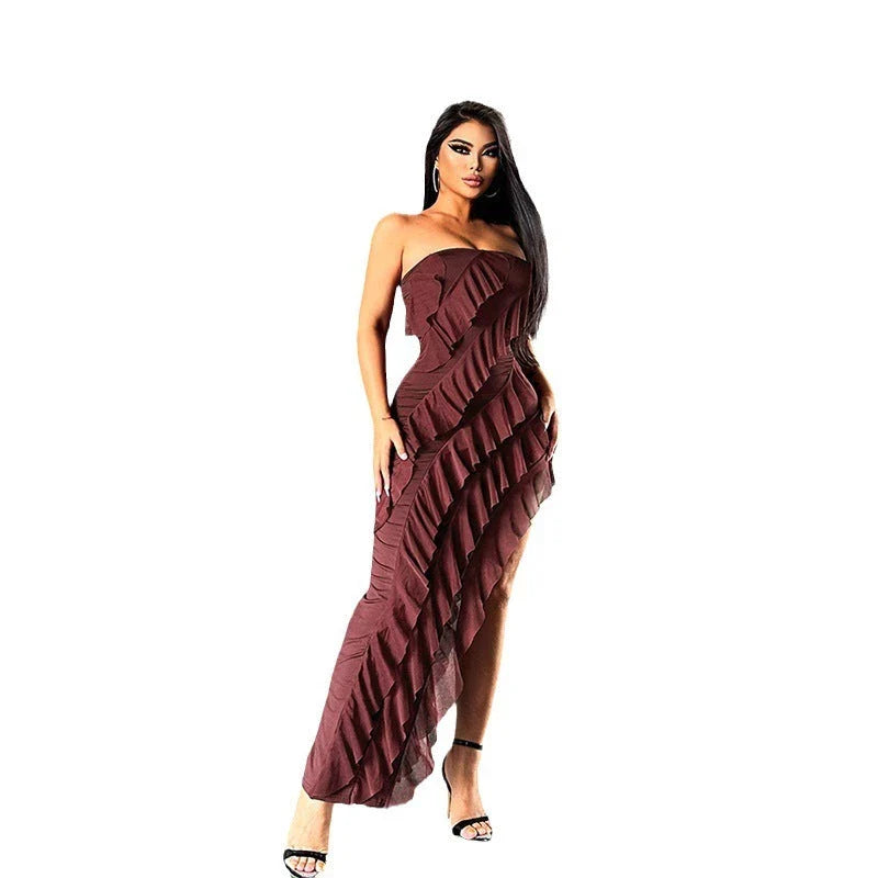 Stylish backless tube top dress with tassel accents in various colors, including black, wine red, red, and brown.