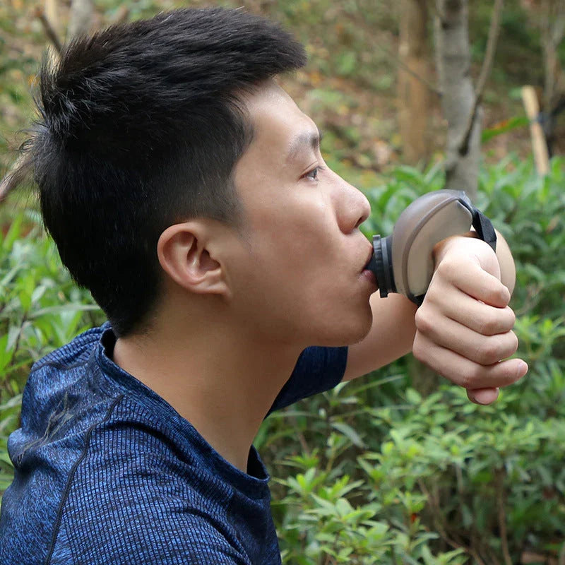Hands-free sports water bottle with silicone mouthpiece and adjustable wrist strap for active lifestyles