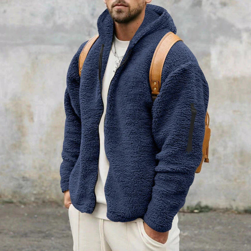 Plush hooded jacket in various colours, featuring a cosy design with a relaxed fit and convenient side pockets
