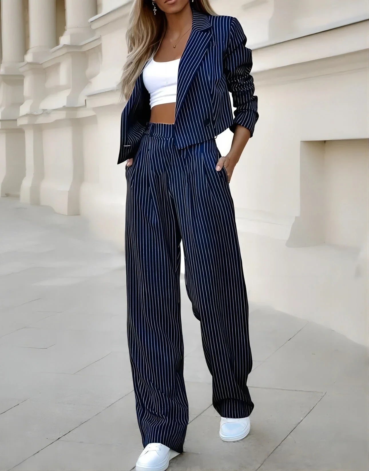 Stylish striped two-piece outfit featuring a cropped top and straight-leg pants in a variety of colors
