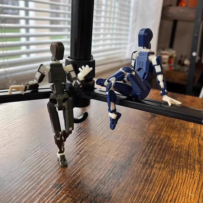 Customizable 3D printed multi-jointed action figure robot toy in various vibrant colors